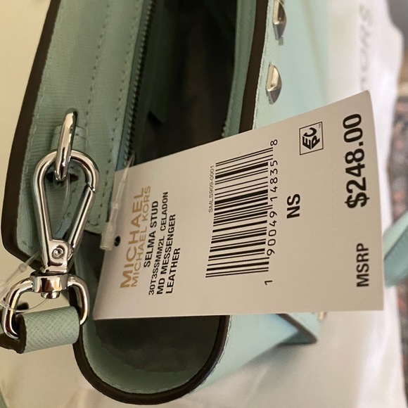 Michael Kors ready for spring sea foam in color purse with shoulder strap. - Picture 2 of 7